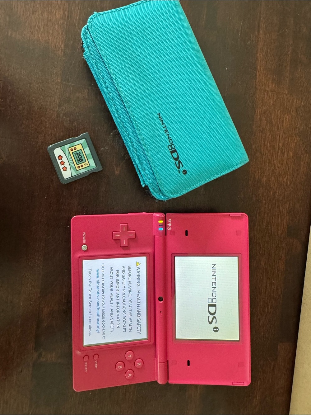 Nintendo DS Lite Pink Handheld with Teal Carrying Case and Game Card
